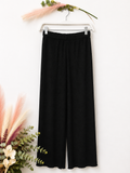 Pantalón marrón plisado